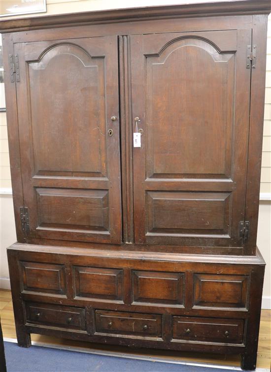 An 18th century oak press cupboard, H.191cm